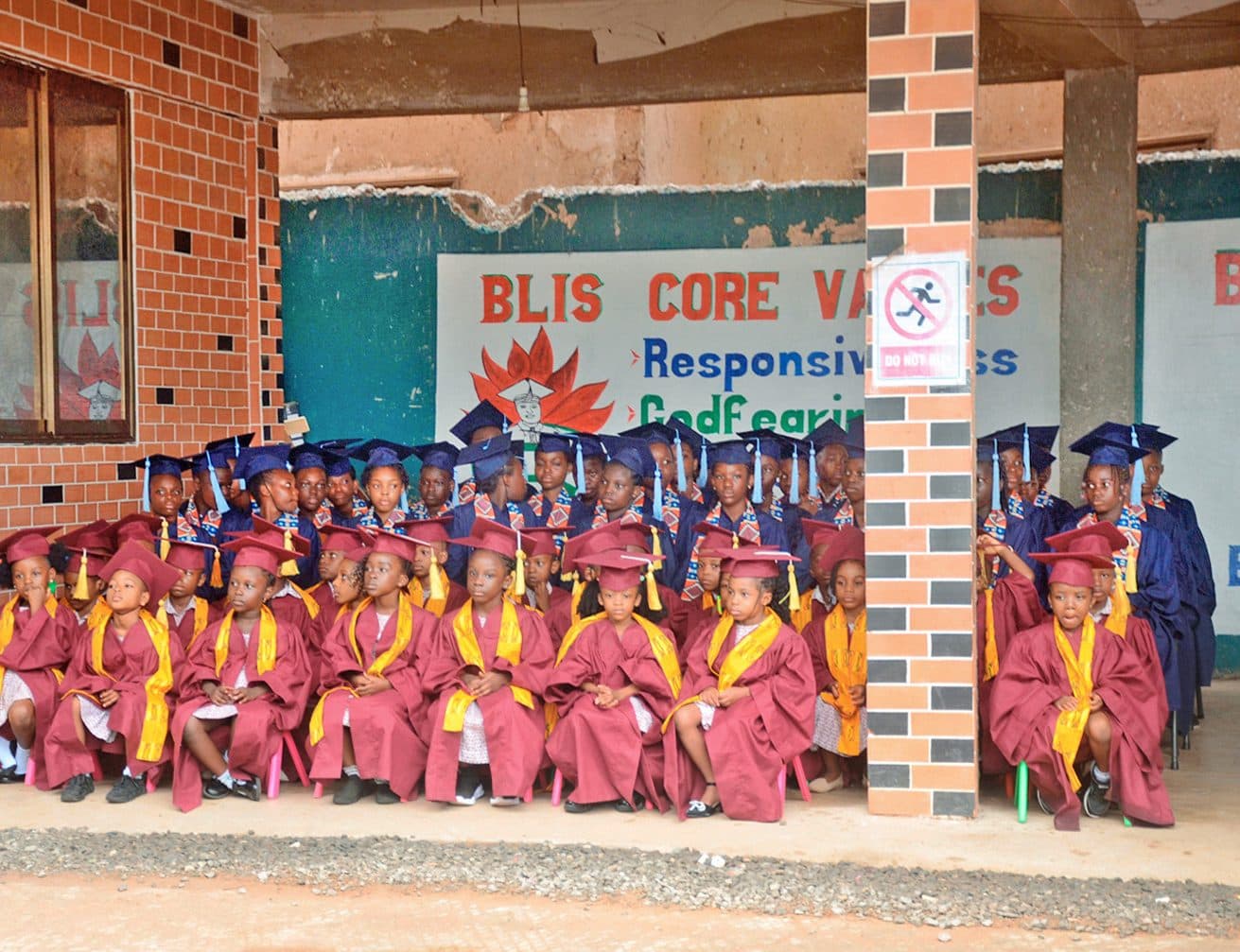 Pupils assembled beneath the school's core values banner